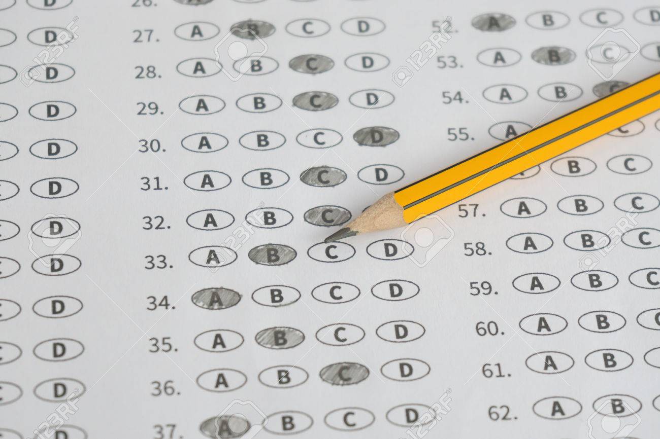 A Pencil Sitting On A Test Bubble Sheet, Optical Form Of An 
